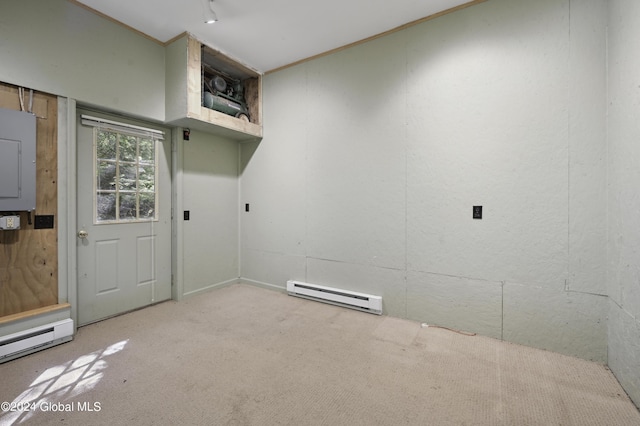 135 Sparrowhawk Lake Rd, Maryland, NY 12155 - laundry area featuring carpet flooring, a baseboard heating unit, electric panel, and crown molding
