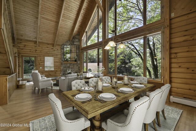 135 Sparrowhawk Lake Rd, Maryland, NY 12155 - dining room with beam ceiling, wooden ceiling, high vaulted ceiling, and wood finished floors