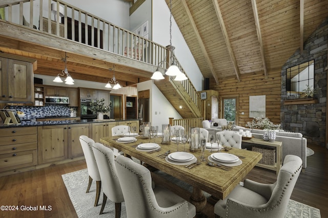 135 Sparrowhawk Lake Rd, Maryland, NY 12155 - dining room featuring a towering ceiling, beam ceiling, light wood-style flooring, and wood ceiling