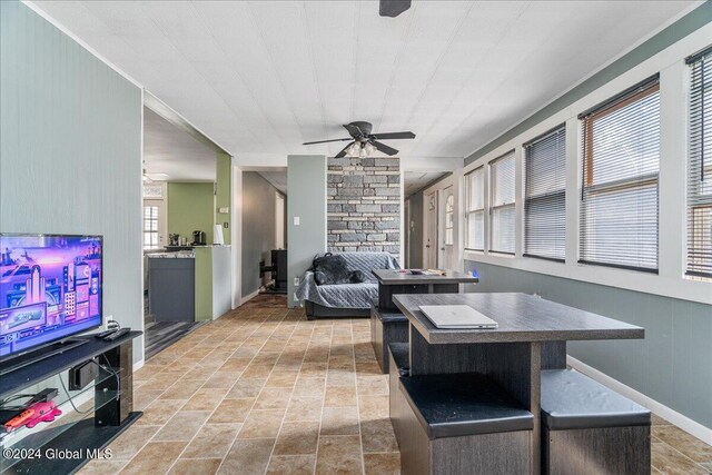 interior space featuring a wealth of natural light and ceiling fan