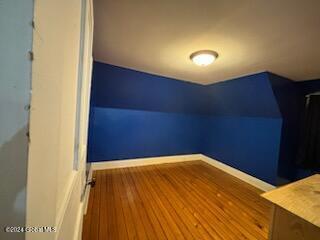 bonus room featuring hardwood / wood-style flooring