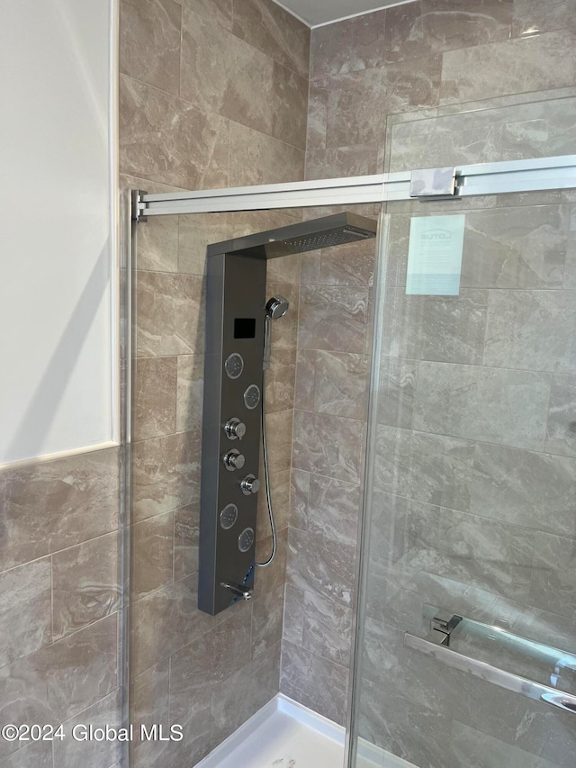 bathroom with an enclosed shower