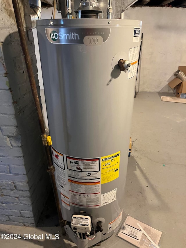 utility room with water heater