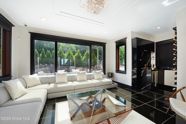 living room with dark tile patterned flooring