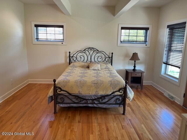 bedroom featuring light wood-type flooring