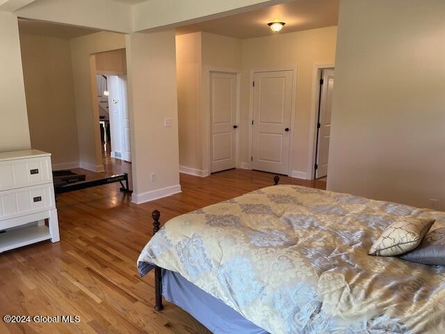 bedroom with light hardwood / wood-style flooring