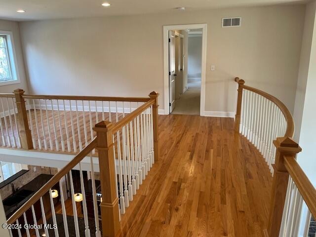 hallway featuring wood-type flooring