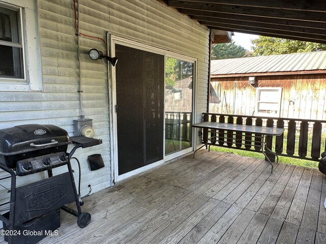 wooden deck with area for grilling