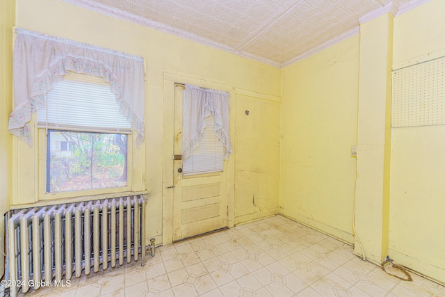 entrance foyer featuring radiator