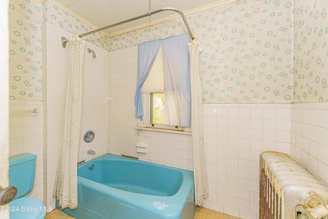 bathroom with tile walls, radiator heating unit, and shower / bath combo with shower curtain