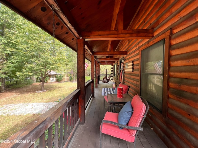 wooden terrace with covered porch