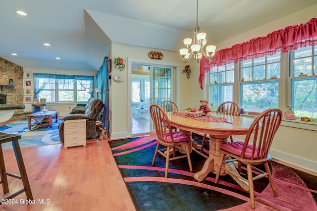 dining area with a chandelier and hardwood / wood-style floors