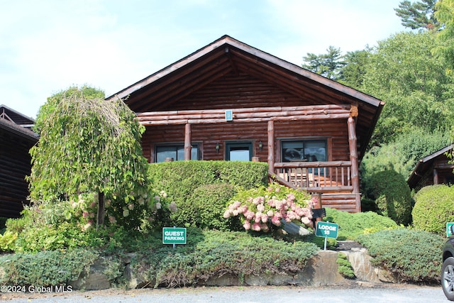 view of log-style house