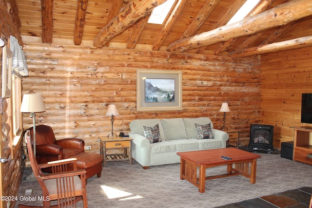 living room featuring wooden ceiling, vaulted ceiling with skylight, and a wood stove