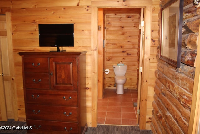 bathroom featuring tile patterned floors and toilet