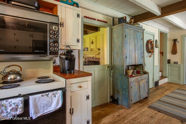 kitchen with light wood-type flooring, beam ceiling, white cabinetry, white electric stove, and wooden ceiling