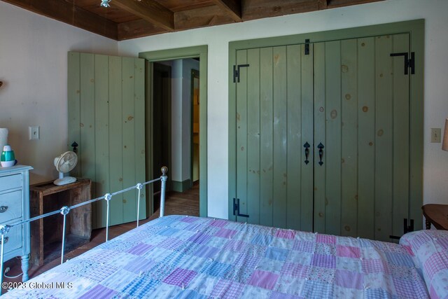 bedroom featuring beam ceiling