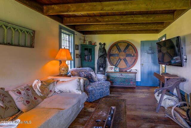 living room featuring wood ceiling, beam ceiling, and dark hardwood / wood-style flooring