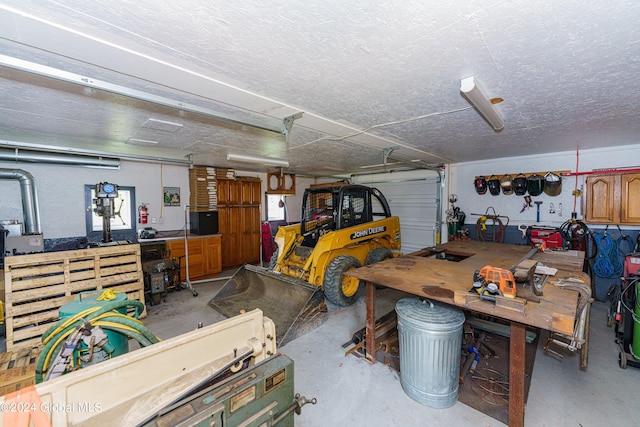 garage with a workshop area