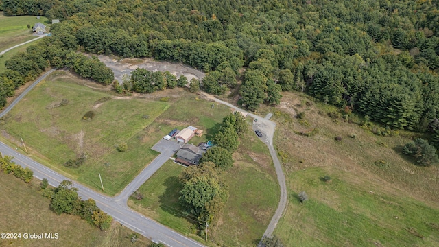 birds eye view of property with a rural view