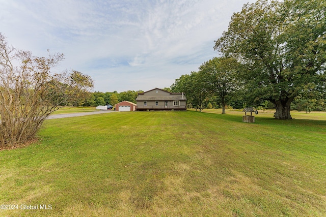 view of yard with a garage