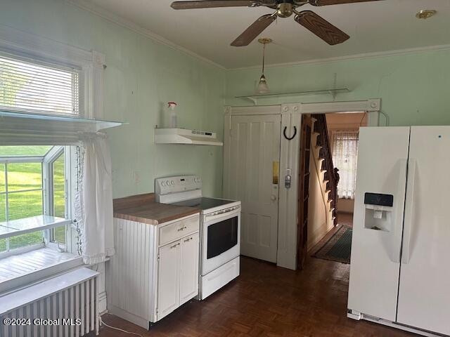 kitchen with white cabinets, ceiling fan, white appliances, ornamental molding, and dark parquet floors