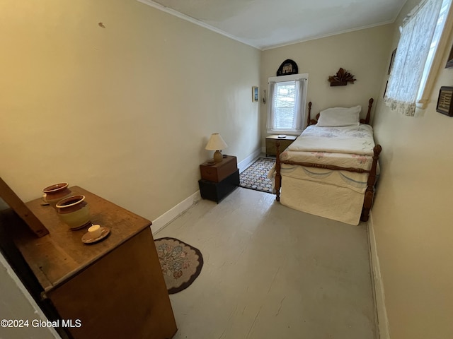 bedroom featuring crown molding