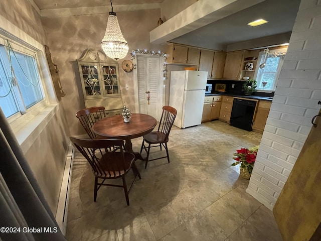 dining area with a chandelier