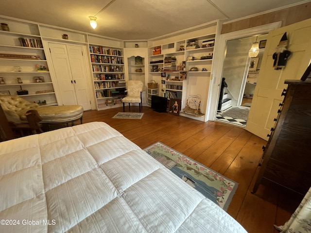 bedroom with wood-type flooring