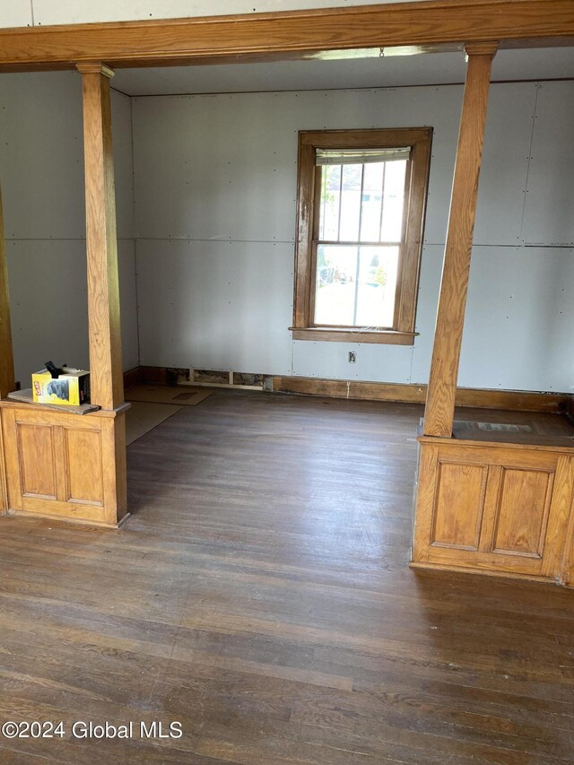 8 First Ln, Port Henry, NY 12974 - spare room with wood finished floors and decorative columns