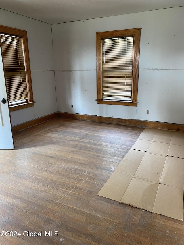 8 First Ln, Port Henry, NY 12974 - spare room featuring wood finished floors and baseboards