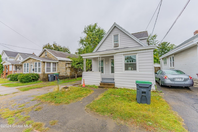 bungalow-style home with a porch