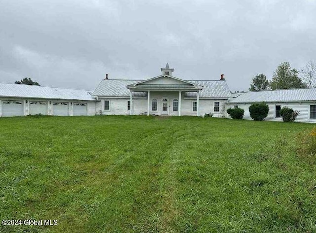 L42.2 Gabryszewski Rd, Saint Johnsville, NY 13452 - back of house featuring a yard and a garage