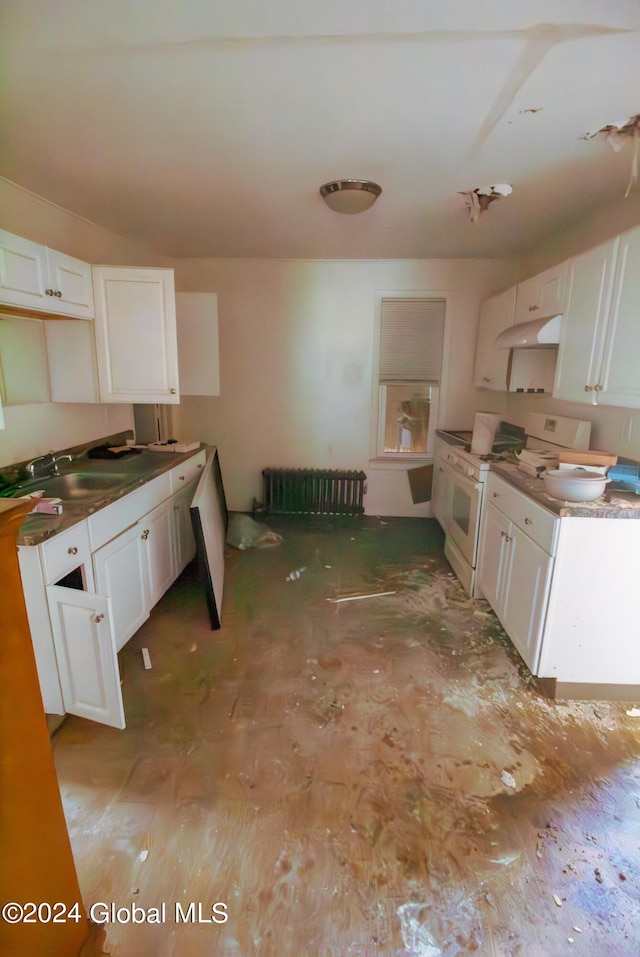 kitchen with white cabinets, sink, and white stove