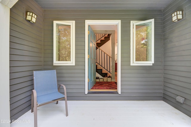 entrance to property featuring a deck