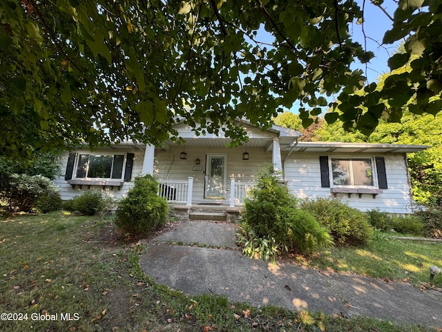 417 Albany-Shaker Rd, Colonie, NY 12211 - view of front of home featuring covered porch