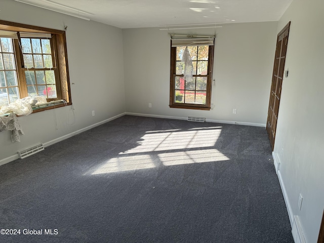 25 Kling Ter, Voorheesville, NY 12186 - spare room with dark colored carpet and baseboards