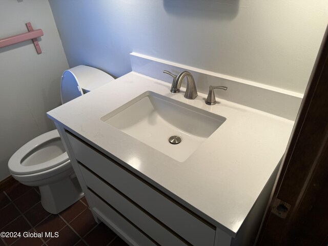 25 Kling Ter, Voorheesville, NY 12186 - bathroom featuring toilet, vanity, and tile patterned flooring