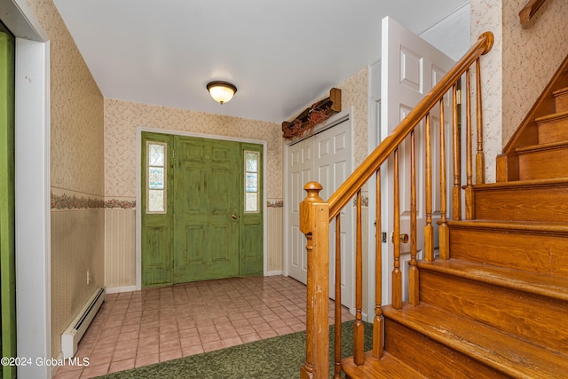 entryway featuring baseboard heating and tile patterned flooring