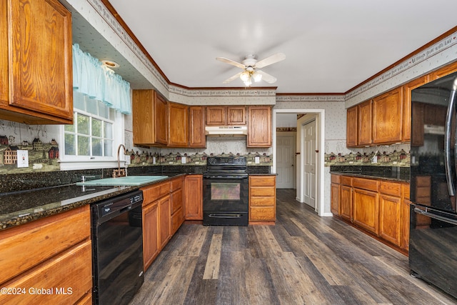 kitchen featuring ceiling fan, crown molding, sink, black appliances, and dark hardwood / wood-style floors