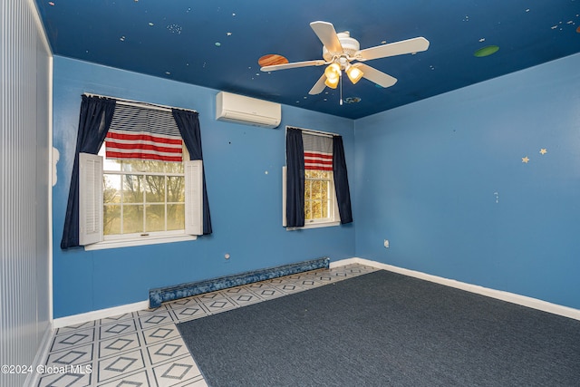 empty room featuring ceiling fan, a baseboard radiator, and a wall mounted AC