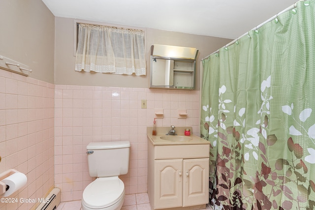 bathroom with vanity, tile patterned flooring, toilet, baseboard heating, and tile walls