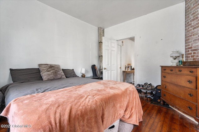 bedroom featuring dark hardwood / wood-style floors