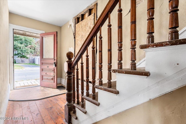 entrance foyer with hardwood / wood-style floors