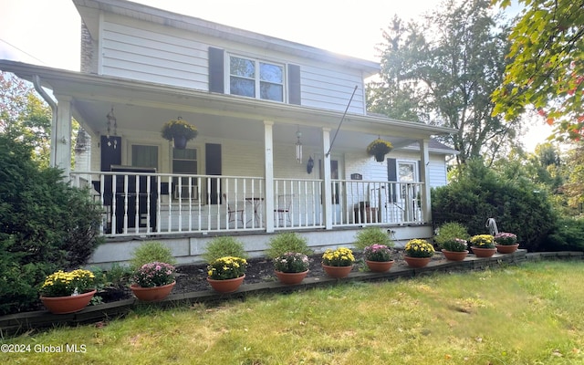 farmhouse-style home with a porch