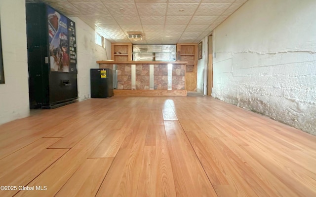 empty room with wood finished floors