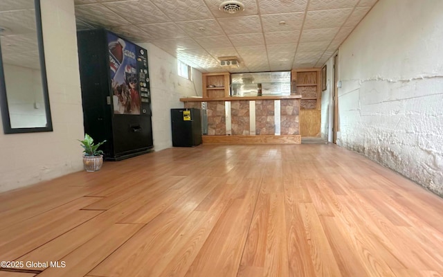 unfurnished living room featuring wood finished floors