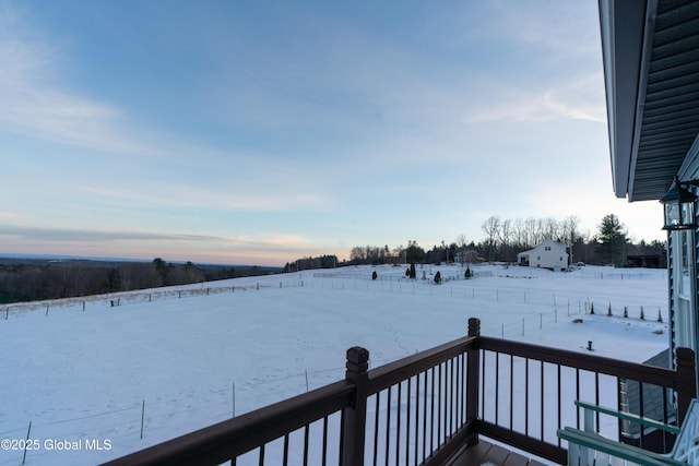 view of yard layered in snow