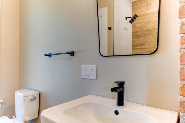 bathroom with toilet and sink