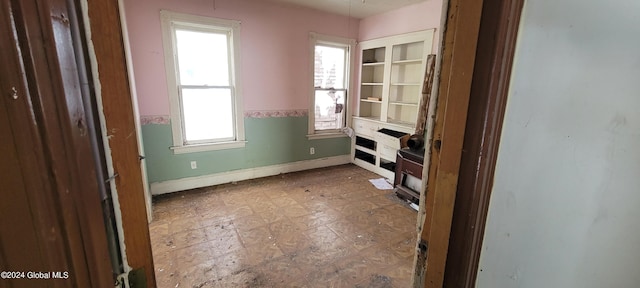 unfurnished room with a wealth of natural light